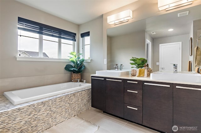 5614 Douglas Ave SE, Auburn, WA 98092 - bathroom featuring double vanity, a garden tub, and tile patterned flooring