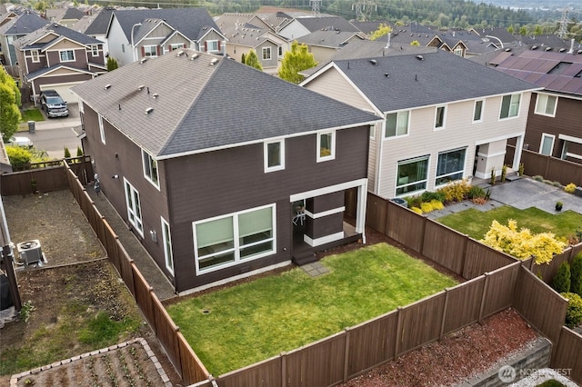 5614 Douglas Ave SE, Auburn, WA 98092 - back of house with a residential view, a shingled roof, and central AC unit