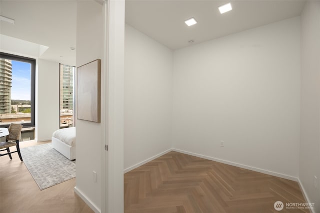 999 110th Ave NE Unit 600, Bellevue, WA 98004 - unfurnished room with baseboards
