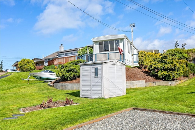 5142 Seaview Dr, Blaine, WA 98230 - rear view of house featuring a sunroom and a lawn