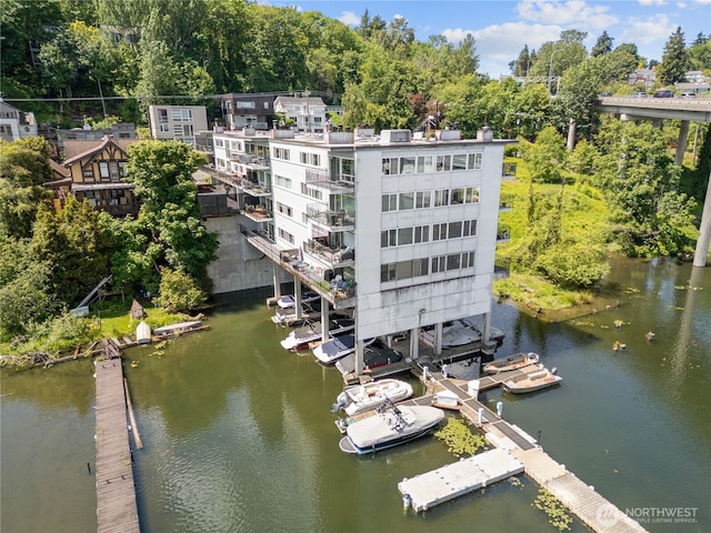2524 Boyer Ave E Unit 108, Seattle, WA 98102 - drone / aerial view of a nearby body of water and a tree filled landscape