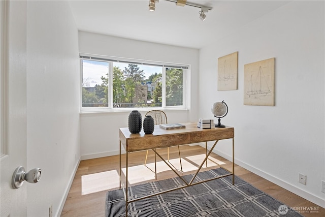 2524 Boyer Ave E Unit 108, Seattle, WA 98102 - office with track lighting, baseboards, and wood finished floors