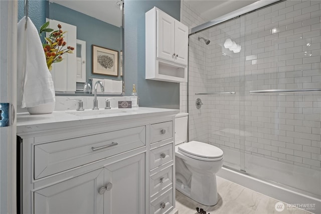 2524 Boyer Ave E Unit 108, Seattle, WA 98102 - full bathroom with vanity, a stall shower, and toilet