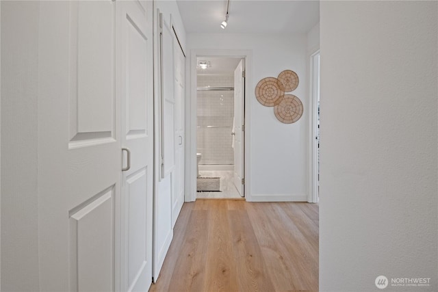 2524 Boyer Ave E Unit 108, Seattle, WA 98102 - hallway featuring light wood-style floors and baseboards