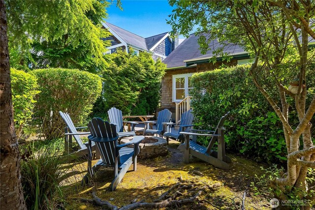 34 Seastar Ln, Pacific Beach, WA 98571 - view of yard featuring an outdoor fire pit