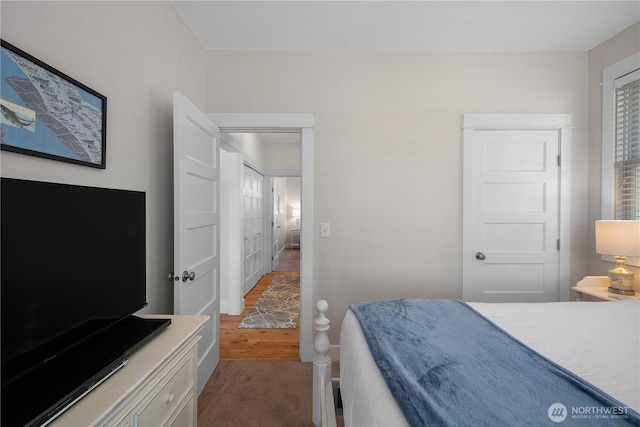 34 Seastar Ln, Pacific Beach, WA 98571 - bedroom featuring wood finished floors and carpet flooring