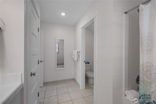 34 Seastar Ln, Pacific Beach, WA 98571 - full bath featuring toilet, tile patterned flooring, recessed lighting, and baseboards