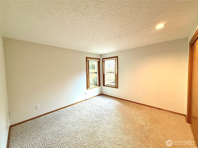 10802 NE 27th Ct, Vancouver, WA 98686 - empty room with carpet floors and baseboards
