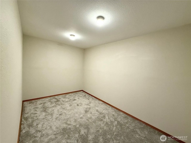 10802 NE 27th Ct, Vancouver, WA 98686 - carpeted spare room featuring baseboards and a textured ceiling