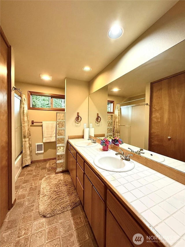 10802 NE 27th Ct, Vancouver, WA 98686 - full bathroom featuring double vanity, recessed lighting, and shower / tub combo with curtain