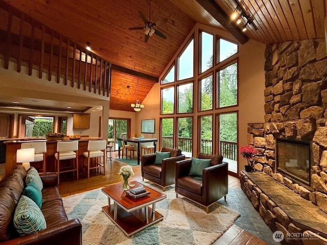 10802 NE 27th Ct, Vancouver, WA 98686 - living room with wooden ceiling, high vaulted ceiling, healthy amount of natural light, wood-type flooring, and a ceiling fan