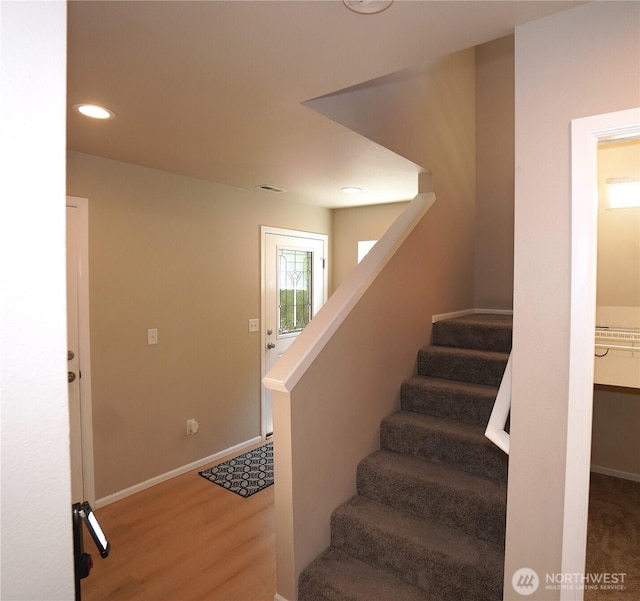 26133 242nd Ave SE, Maple Valley, WA 98038 - staircase with wood finished floors, baseboards, and recessed lighting