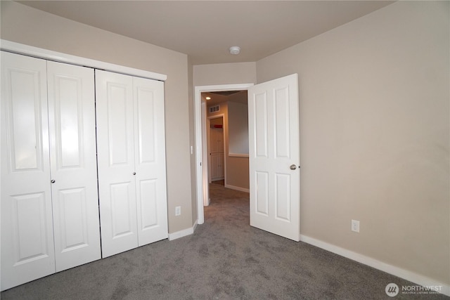 26133 242nd Ave SE, Maple Valley, WA 98038 - unfurnished bedroom featuring carpet, baseboards, and a closet