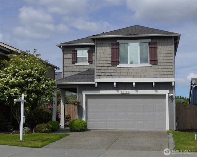 26133 242nd Ave SE, Maple Valley, WA 98038 - view of front of house featuring an attached garage, driveway, and a shingled roof