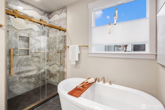 11407 73rd Ave NE, Arlington, WA 98223 - bathroom featuring a freestanding bath, a marble finish shower, and tile patterned floors