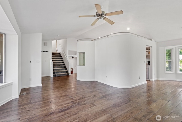 26005 225th Ct SE, Maple Valley, WA 98038 - unfurnished living room featuring ceiling fan, stairway, wood finished floors, lofted ceiling, and baseboards