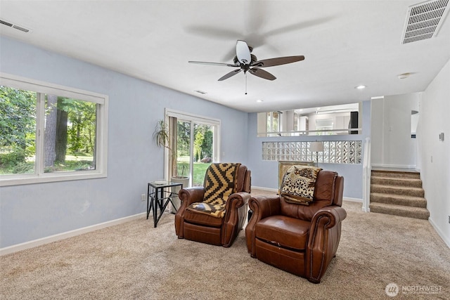 26005 225th Ct SE, Maple Valley, WA 98038 - sitting room with carpet flooring, a ceiling fan, stairway, and baseboards