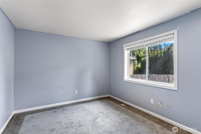 26005 225th Ct SE, Maple Valley, WA 98038 - carpeted spare room featuring baseboards