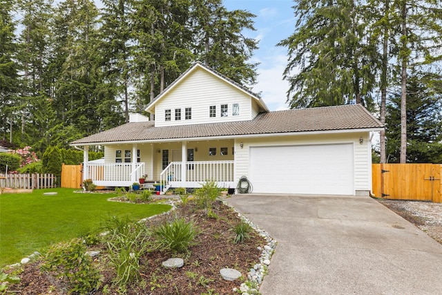 140 E Mountain View Dr, Allyn, WA 98524 - view of front of property with covered porch, driveway, an attached garage, and a tile roof