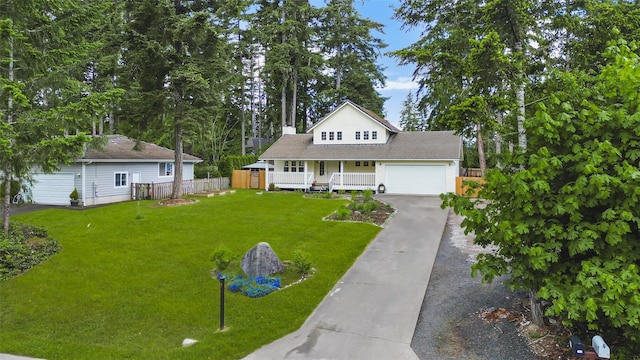 140 E Mountain View Dr, Allyn, WA 98524 - view of front facade featuring a porch, asphalt driveway, and an attached garage