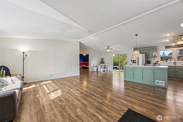 17419 11th Avenue Ct E, Spanaway, WA 98387 - living area featuring a ceiling fan, healthy amount of natural light, dark wood-style floors, and lofted ceiling