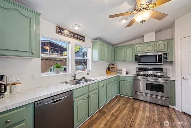 17419 11th Avenue Ct E, Spanaway, WA 98387 - kitchen featuring appliances with stainless steel finishes, a sink, vaulted ceiling, dark wood finished floors, and ceiling fan