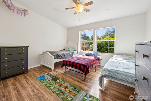 17419 11th Avenue Ct E, Spanaway, WA 98387 - bedroom with wood finished floors, a ceiling fan, and baseboards