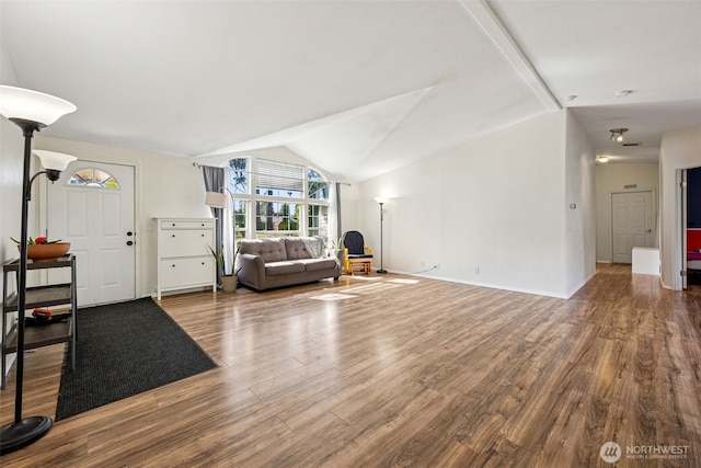 17419 11th Avenue Ct E, Spanaway, WA 98387 - living room with wood finished floors, vaulted ceiling, and baseboards