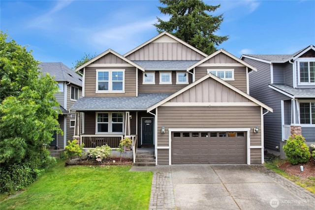 2529 10th Ct SE, Olympia, WA 98501 - craftsman-style house featuring board and batten siding, covered porch, concrete driveway, roof with shingles, and a front lawn