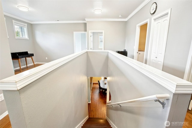 2529 10th Ct SE, Olympia, WA 98501 - stairs featuring ornamental molding, wood finished floors, and baseboards