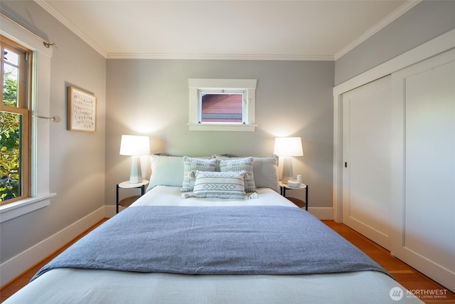 528 N 83rd St, Seattle, WA 98103 - bedroom featuring wood finished floors, ornamental molding, and baseboards