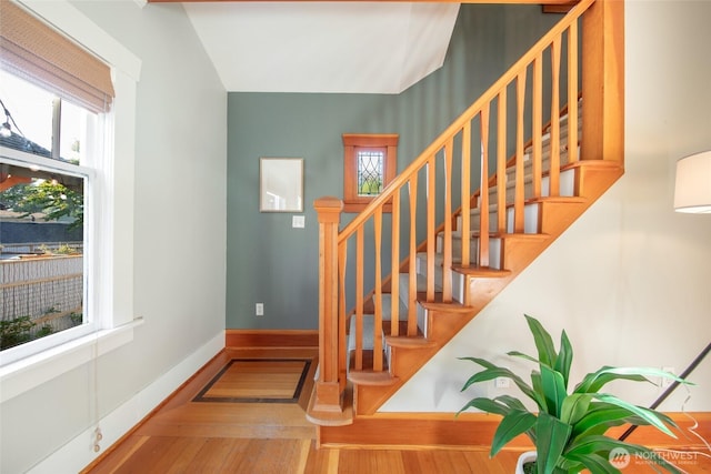 528 N 83rd St, Seattle, WA 98103 - stairway with hardwood / wood-style flooring and baseboards