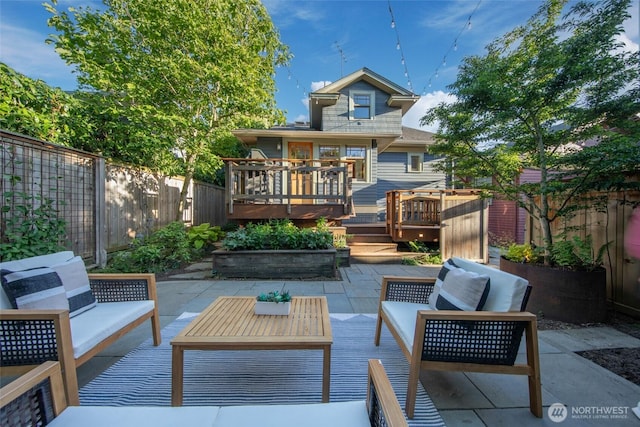528 N 83rd St, Seattle, WA 98103 - back of house featuring a deck, an outdoor hangout area, a fenced backyard, and a patio