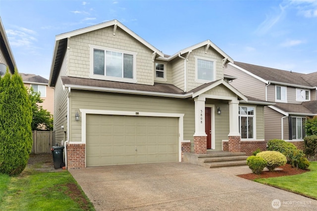 3808 Wildspitz St SE, Lacey, WA 98503 - craftsman house with brick siding, a garage, and concrete driveway