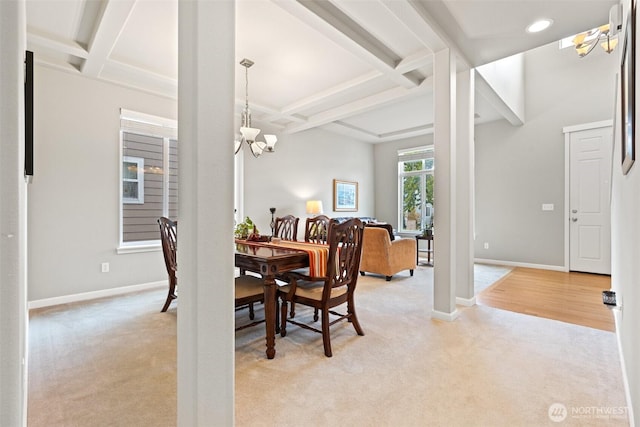 3808 Wildspitz St SE, Lacey, WA 98503 - dining room featuring a chandelier, light carpet, beam ceiling, coffered ceiling, and baseboards