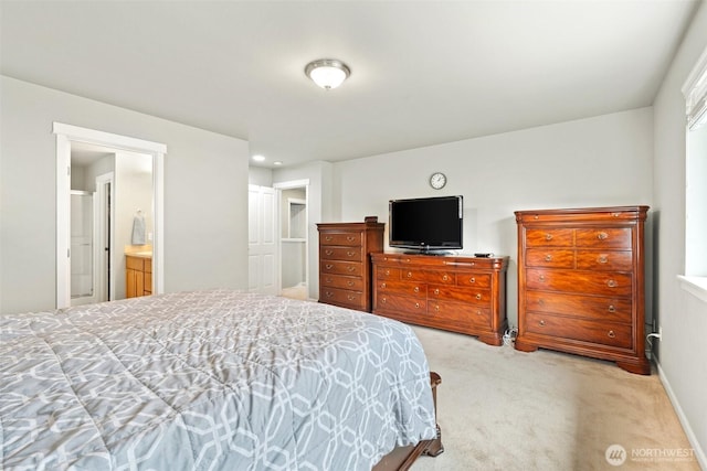 3808 Wildspitz St SE, Lacey, WA 98503 - bedroom with carpet floors, baseboards, and connected bathroom
