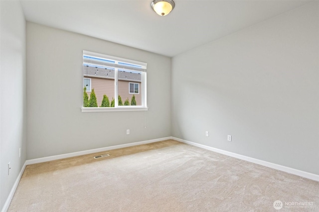 3808 Wildspitz St SE, Lacey, WA 98503 - carpeted empty room with baseboards