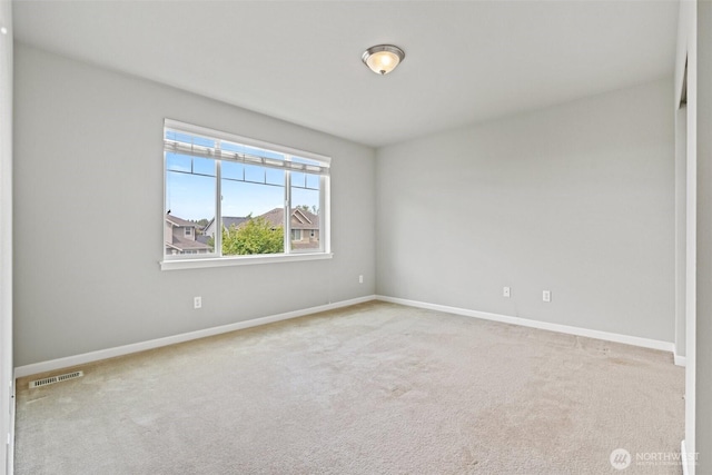 3808 Wildspitz St SE, Lacey, WA 98503 - carpeted spare room featuring baseboards