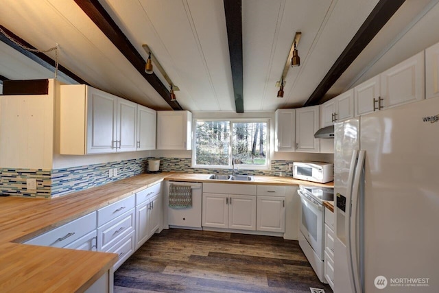 7300 V Pl, Long Beach, WA 98631 - kitchen featuring white appliances, wood counters, and backsplash