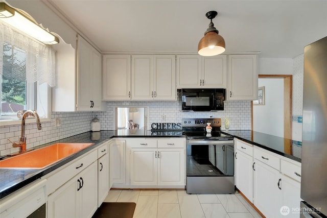 284 Division Ave, Morton, WA 98356 - kitchen featuring black microwave, stainless steel range with electric stovetop, a sink, tasteful backsplash, and dishwashing machine