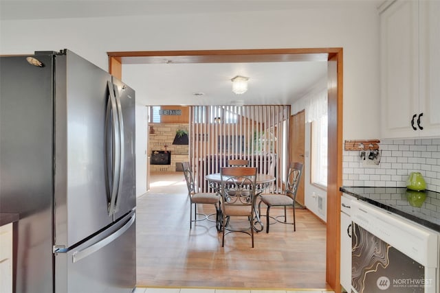 284 Division Ave, Morton, WA 98356 - dining area featuring plenty of natural light and light wood-style flooring