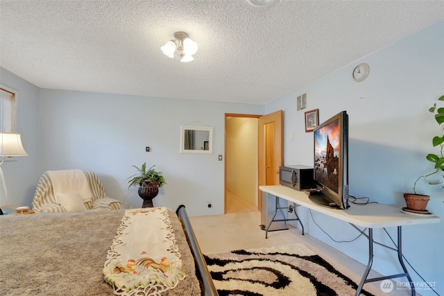 284 Division Ave, Morton, WA 98356 - bedroom featuring a textured ceiling and light colored carpet