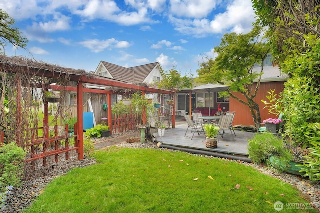 284 Division Ave, Morton, WA 98356 - view of yard with a wooden deck, outdoor dining space, and a pergola