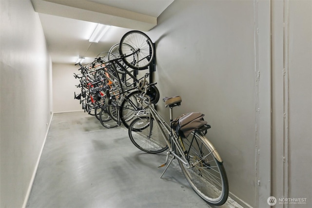 8005 Sand Point Way NE Unit A45, Seattle, WA 98115 - garage featuring bike storage and baseboards