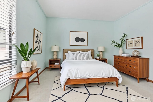 8005 Sand Point Way NE Unit A45, Seattle, WA 98115 - bedroom with light carpet, baseboards, and ornamental molding
