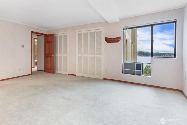 8005 Sand Point Way NE Unit A45, Seattle, WA 98115 - unfurnished room featuring baseboards, carpet floors, and crown molding