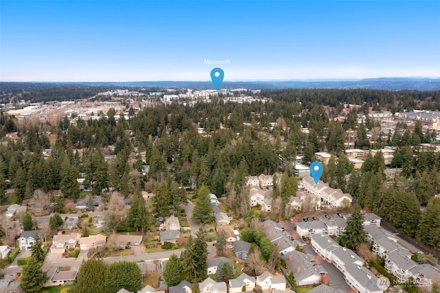 1045 156th Ave NE, Bellevue, WA 98007 - aerial overview of property's location with nearby suburban area and a heavily wooded area