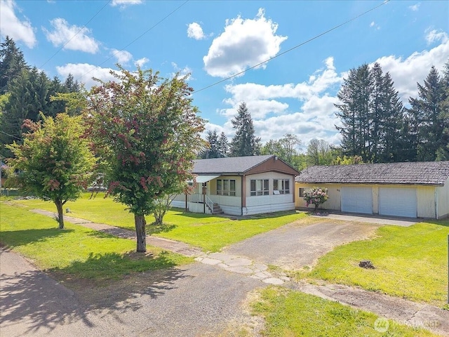 315 Washington St, Pe Ell, WA 98572 - view of front of property with an outdoor structure and a front yard