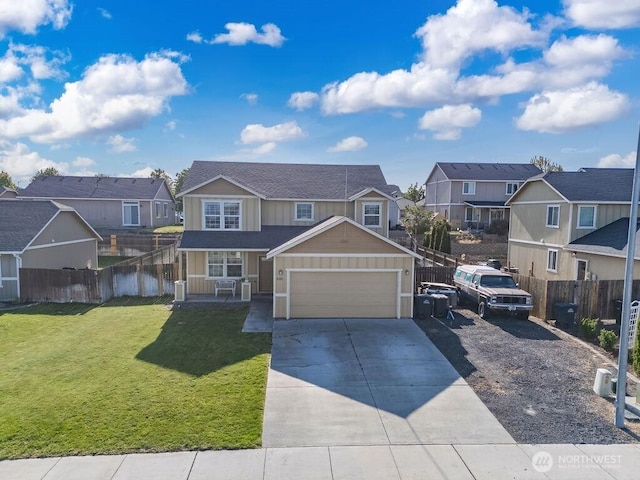 530 N Kentucky Dr, Moses Lake, WA 98837 - traditional-style house featuring a residential view, a garage, and concrete driveway
