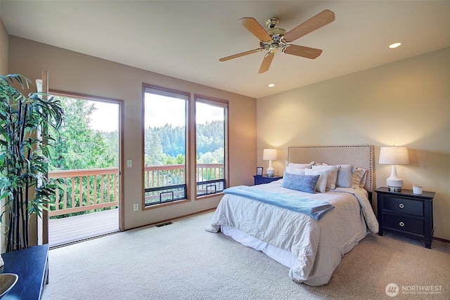 9430 Hoeder Ln, Bothell, WA 98011 - bedroom with access to exterior, carpet, multiple windows, and recessed lighting
